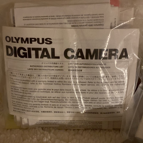 Gifted.  Olympus Digital Camera with all that came with it. Original cost $150. - Picture 3 of 9